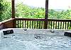 Enjoy this beautiful mountain view while soaking in the Hot Tub from the lower deck of the cabin