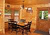 The Dining Nook provides seating for 4 guests with 2 extra bar stools located at the kitchen bar.