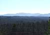 Sitting on the front porch you will enjoy long range view of the seemingly unending mountains.  They just keep going and going.