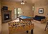 Your family can enjoy a game of pool or foosball in the spacious family room. There is a Playstation 2 on the TV, a Full Size Refrigerator and Kitchenette area where you can enjoy popcorn and a movie also.