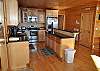 Fully Equipped Kitchen with Stainless Steel Appliances Granite Cabinet Tops and all the small appliances.