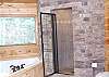 The adjoining master bathroom is so inviting with a fabulous Jacuzzi Tub and custom rock/tile shower which offers double shower heads.