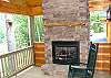 Outdoor Gas Fireplace on deck adjoining the Master Bedroom.