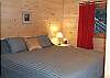 There is also a King Size Bed located in the lower bedroom.