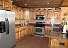 The cabin has a fully furnished Kitchen with granite counter tops and stainless steel appliances.