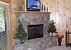 Enjoy a game of Pool or a Movie or just sit back by the gas burning fireplace.  There is also access to the Hot Tub Patio from the family room.