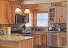 Fully Equipped Kitchen with Stainless Steel Appliances. Microwave, Coffeemaker, Waffle Iron will make you feel right at home.