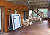Enjoy a game of Ping Pong, enjoy the rocking chairs or just relax in the  swing on the entertainment porch.