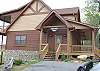 There are 3 levels of decks from which you can enjoy a breathtaking long- range mountain view.  Don't Miss Out on This Awesome Cabin