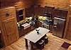 Fully Furnished Kitchen has Professional Line of Stainless Steel Frigidare appliances
