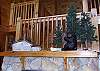 The mantle above the gas log fireplace offers an invting view as you climb the stairway to the loft area.
