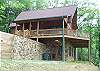 View of Deer Ridge from the entrance side.  Easy access to the firepit and area to feed the deer.