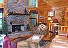 Sit back and relax around the beautiful gas log fireplace located in the living room.  There is also a flatscreen TV for your evening entertainment