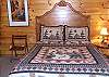 the upstairs bedroom has aQueen size bed with adjoining Bathroom which is accessible from the bedroom and the loft area.