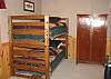 The bunk beds are great for a family with small children. These beds are located in the same bedroom with the Queen Bed in the second bedroom. The bedroom is located in the lower level of the cabin