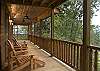 Enjoy the Mountain view from the Wrap around deck of the cabin.  Relax in one of the many chairs provided or the porch swing.