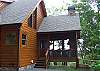 The screened deck is located off the Kitchen area and offers a gas log fireplace and also a gas grill