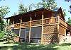 The cabin has a  screened enclosure which provides a private Hot Tub area which is accessible from the Master Bedroom.  On the top deck is the long covered porch which houses a gas burning fireplace to enjoy on those cool evenings.