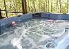 Enjoy the 4 person Hot Tub on the screened patio located on the lower level of the cabin.