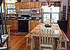 The dining table provides seating for up to 8 with extra seating on the covered deck where you can also enjoy your evening meals