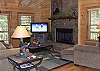 Relax and enjoy your favorite show or the gas log fireplace in the living room.