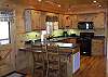 Fully Furnished Kitchen with extra seating at the bar.