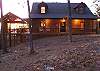 A night time view of the cabin is a welcoming site.