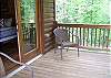 The private deck is located off the master bedroom for a great early morning view of the creek.
