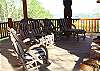 Enjoy the beautiful mountain view while sitting by the outdoor woodburning fireplace.