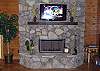 Living Room Fireplace with Flatscreen LCD TV.