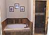 Enjoy soaking in the Jacuzzi Tub or a nice long shower in the Custom Tile Shower in the Master Bathroom