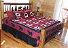 The main level bedroom has a King Bed with access to the screened porch.