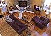 The living room is centered around the gas burning fireplace and LCD TV.