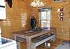The large dining table provides a great time for visits with your family.
