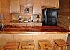 Serve refreshments from the Wet Bar with Full Size refrigerator while enjoying a game of Pool or Foosball also located in the family room
