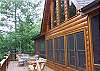 Enjoy Dining Outside on the front deck and then relax in the rocking chairs or hammock provided.