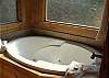 Relax in the Jacuzzi Tub located in the Master Bathroom