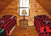 The Lofr of the cabin offers 2 twin beds and also provides the area for the foosball table.  Great area for yourchildren to enjoy their time at the cabin.