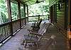 Sit in the quietness and enjoy a nice evening from the covered porch of the cabin.