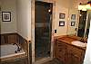 Master Bathroom has a Custom Tile Shower and Jacuzzi Tub.