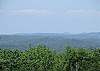 Enjoy a long range mountain view from all the decks of the cabin.