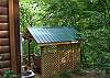 For Privacy the Hot Tub Deck is surrounded by lattice and a covered deck with lighting for your nightime enjoyment.