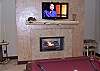 You can also enjoy the warmth of the gas log fireplace in the family room while playing a game of pool.