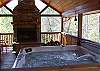 Enjoy nature all around from the Hot Tub Deck.  Soak your cares away in the 5 person Hot Tub. Then warm up by a wood burning fire.