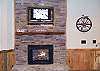 Enjoy your favorite show from Direct TV on the 32" HD TV while you warm up by the stacked stone fireplace with gas burning logs.