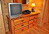 There is a TV located in the bedroom on the Main Level also.