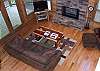 View of the spacious living room for the cabin from the loft area.