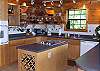Fully equipped kitchen with Single Wall Oven, Surface Unit, Microwave, Coffee Maker.