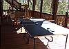 The lower Deck offers a Ping Pong Table, Porch Swing and Rocking Chairs for your enjoyment.