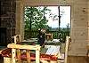 Dining Room seats 8 in front of a beautiful view from the dining room window
